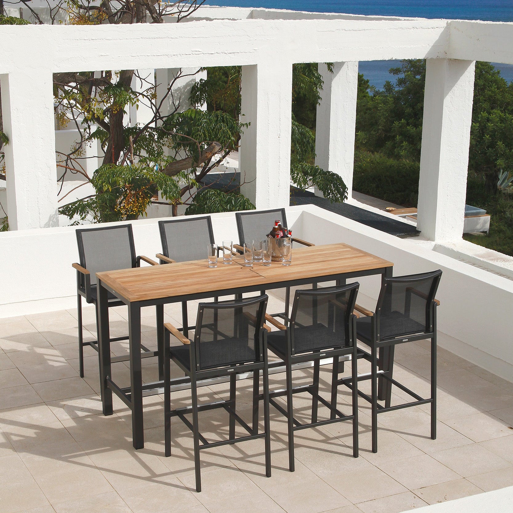 Barlow Tyrie Aura Teak and Aluminum Rectangular 79" Dining Table pictured with Aura High Dining Armchairs