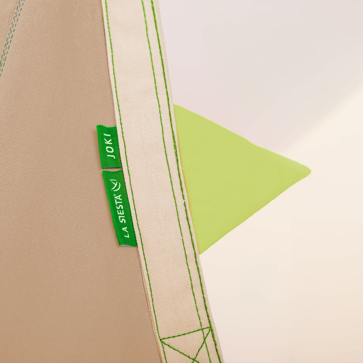 Close-up of the padded edge and label on the La Siesta Joki kids hanging nest
