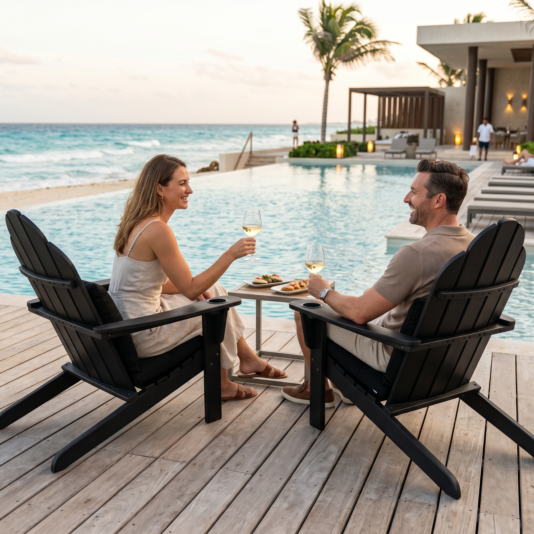 Couple enjoying a romantic moment by a pool with ocean view
