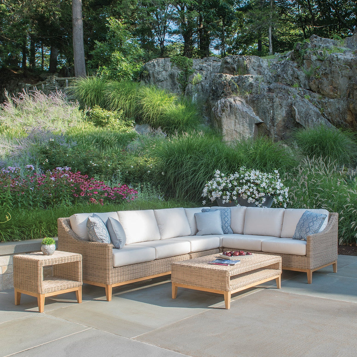 Kingsley Bate Frances wicker sectional set in a garden setting