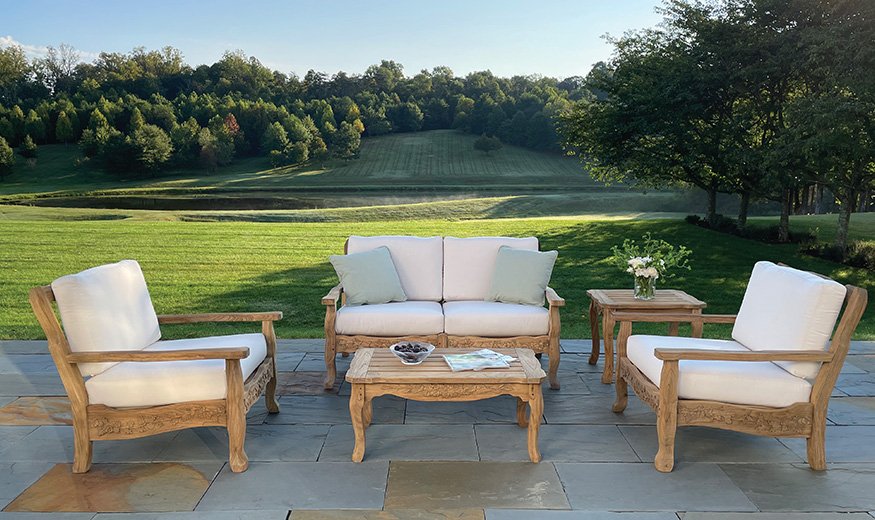 Kingsley Bate Normandy distressed teak 5-piece deep seating ensemble on a terrace