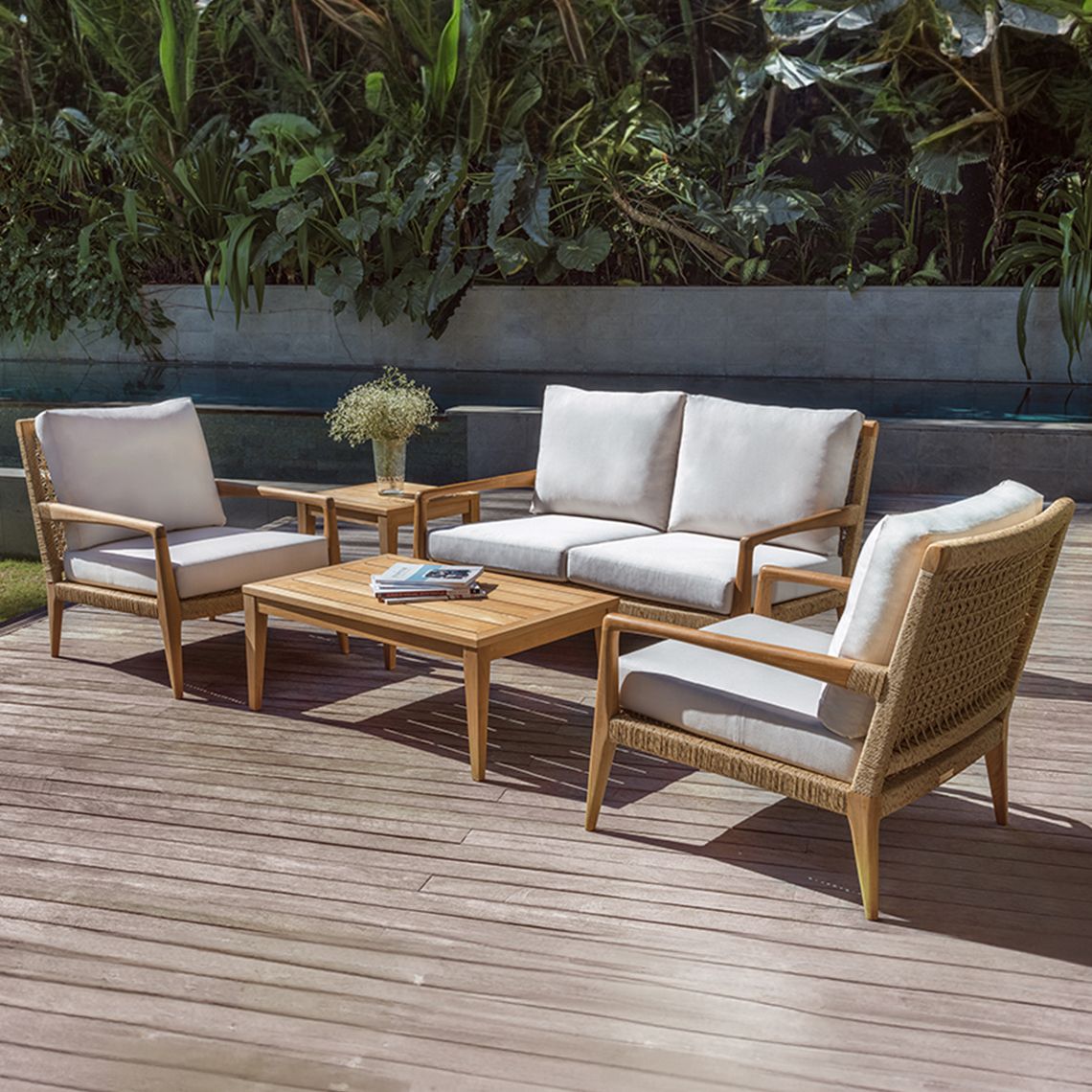 Barcelona Lounge Chairs and Settee shown with 5453 Canvas cushions and paired with Tribeca occasional tables in Grade A teak.