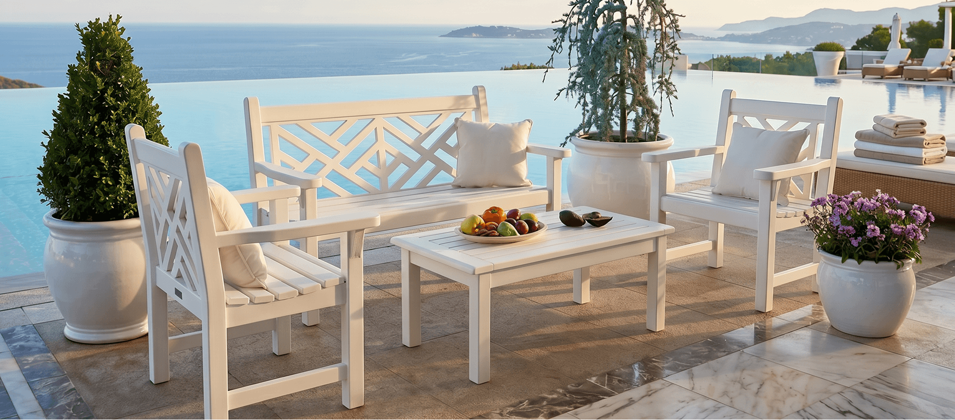 Chippendale seating beside an infinity pool