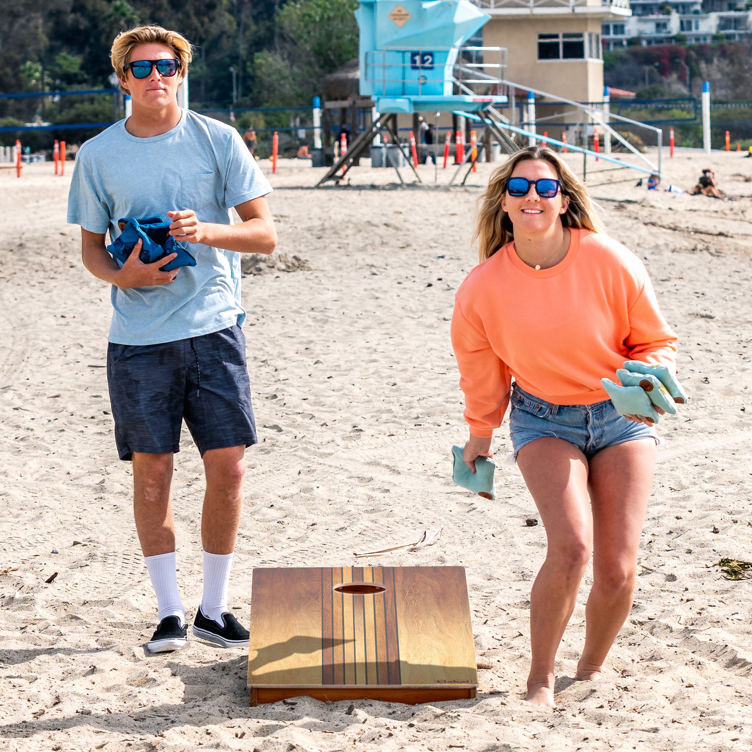Elakai Retrto Woody Cornhole board game on the beach
