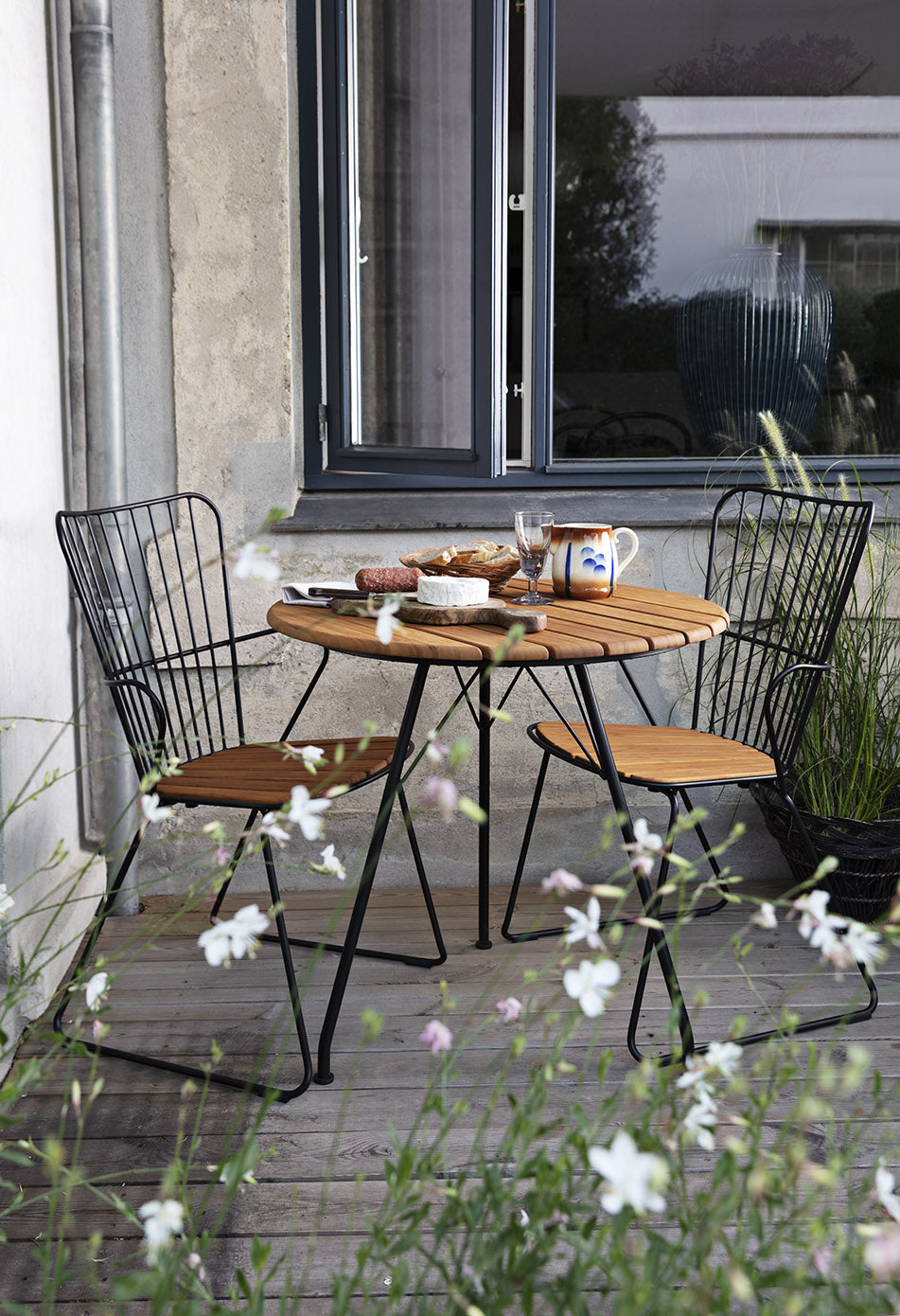 Circum Bamboo Cafe Table pictured with the Paon Dining Armchair Item - HOU-12801 (sold separately)